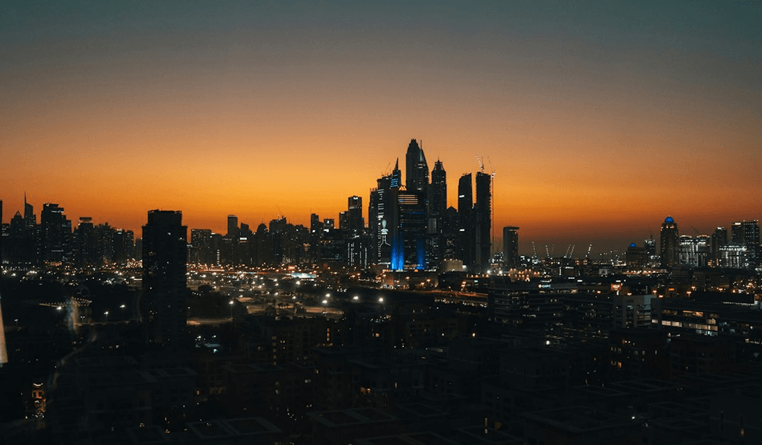 Dubai skyline at sunset representing coverage across all seven emirates